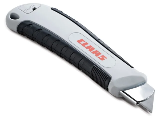 Herramienta de corte de seguridad original CLAAS con diseño ergonómico. Ideal para la apertura de embalajes de recambios y trabajos de mantenimiento en el taller o la explotación agrícola.