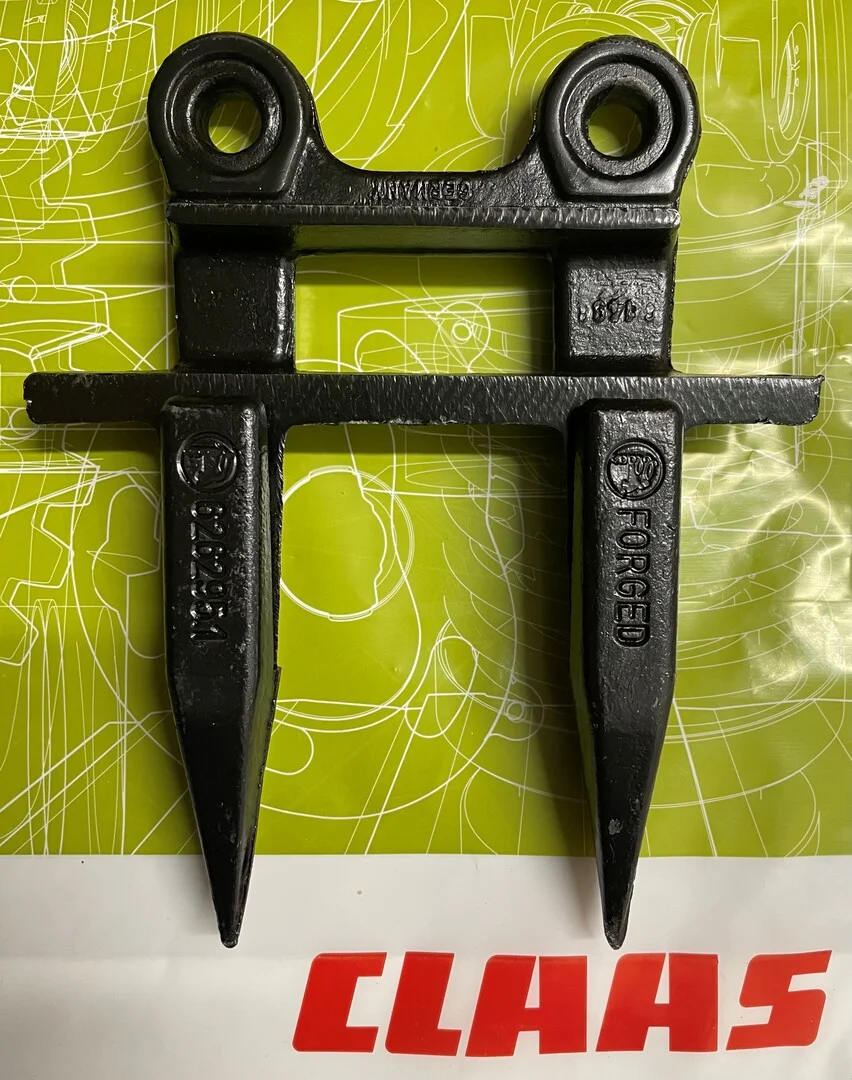 Diente doble original CLAAS para barra de corte de cosechadora en oferta. Recambio de alta resistencia diseñado para un corte preciso y duradero en campaña.