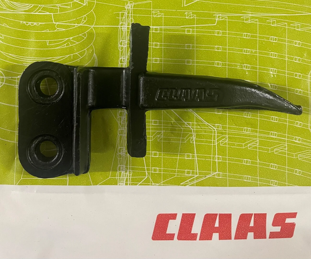 Diente simple original CLAAS para barra de corte de cosechadora en oferta. Recambio oficial de alta resistencia diseñado para un corte limpio y duradero en campaña.
