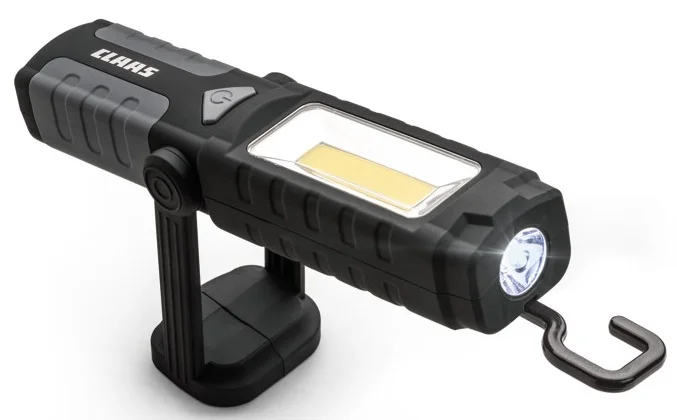 Linterna de trabajo LED CLAAS con gancho de sujeción y base magnética. Ideal para reparaciones nocturnas o en zonas oscuras de maquinaria agrícola.